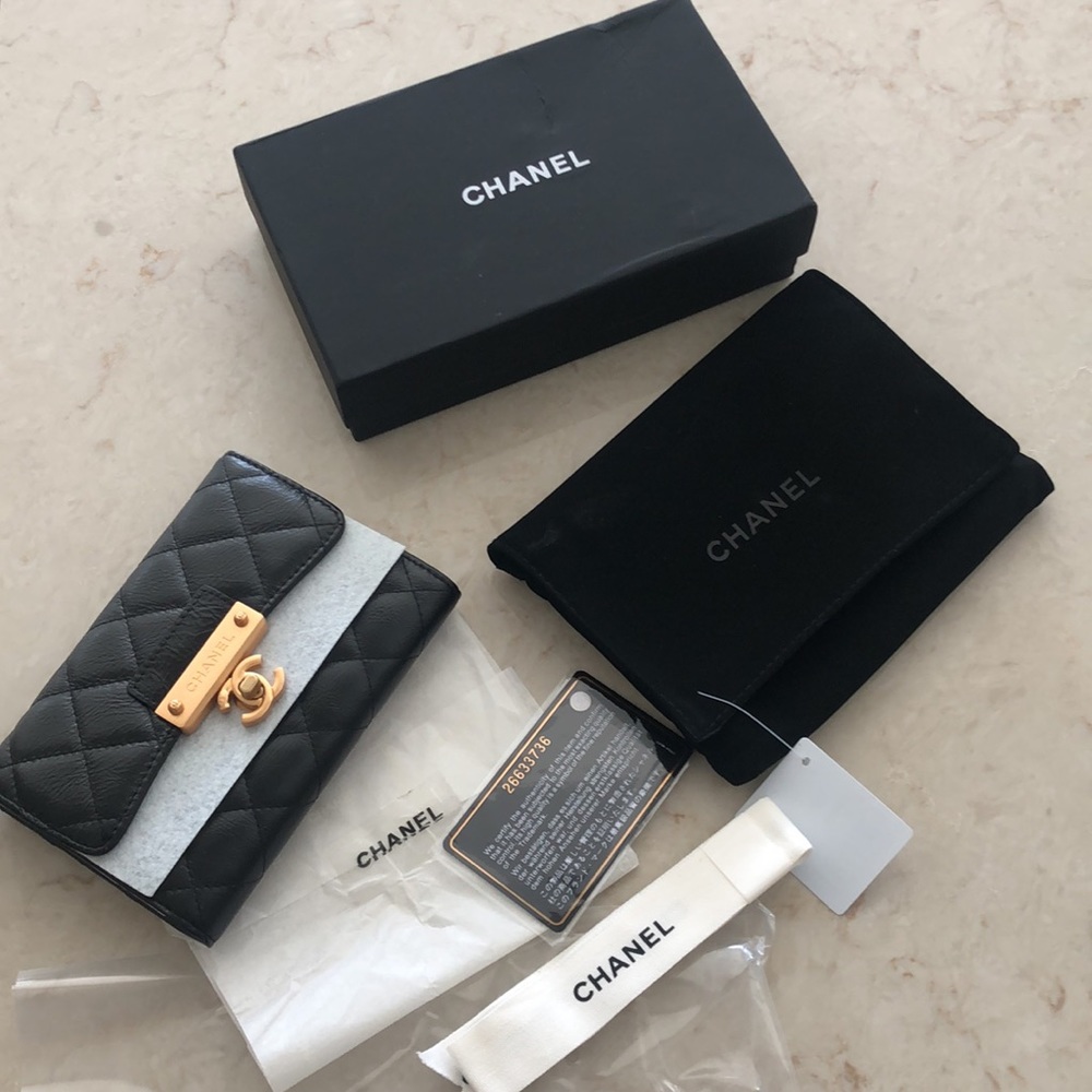 CHANEL Black and Gold Quilted Wallet